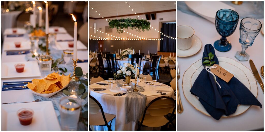 Beautiful wedding reception tablescapes and table setting with white florals, overhead greenery and string lights, blue goblets and cloth napkins